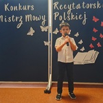 Mistrz Mowy Polskiej - konkurs, chłopiec recytuje wiersz