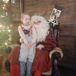 Z wizytą u świętego Mikołaja - dziecko z Mikołajem 