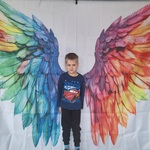 Niebieskie Igrzyska- dziecko na tle fotograficznym